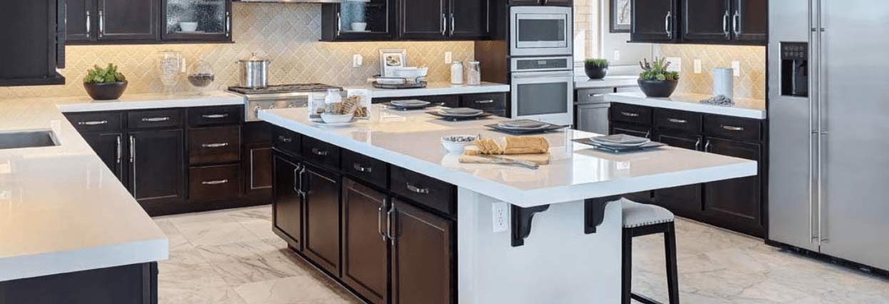 kitchen room scene stone countertop dark wood cabinets